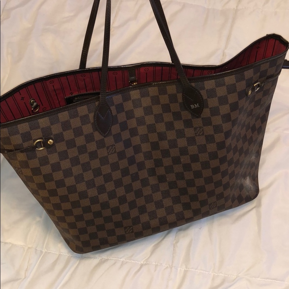 Has initials “BM” engraved on handle